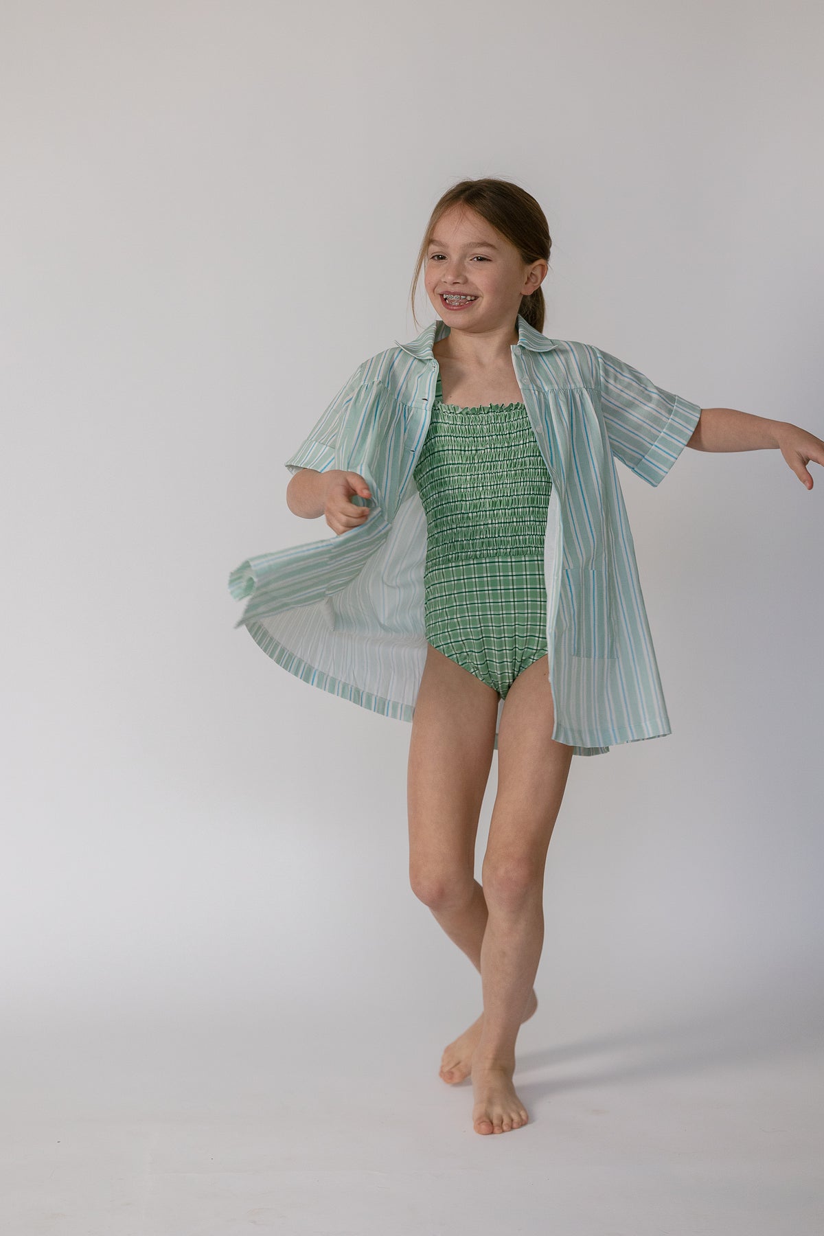 Tessa Smocked One Piece in Apple Check